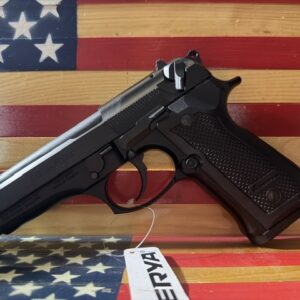 Black handgun on American flag background