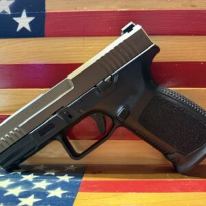 Handgun displayed against American flag background