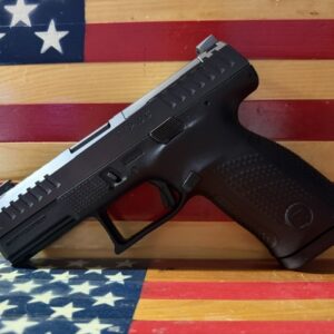 Black semi-automatic handgun on American flag