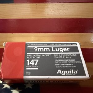 Box of 9mm Luger ammunition on American flag