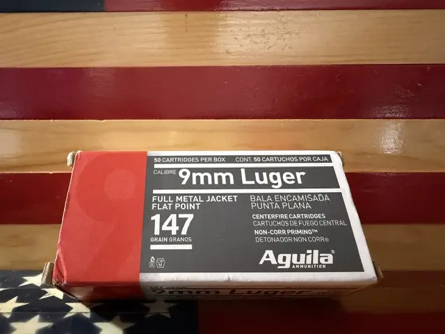 Box of 9mm Luger ammunition on American flag