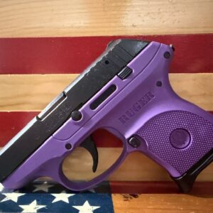 Purple Ruger handgun on American flag background