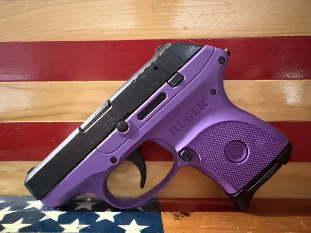 Purple Ruger handgun on American flag background