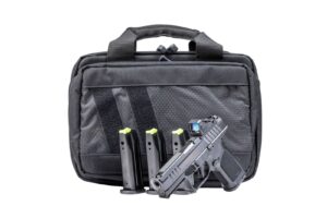 Handgun with magazines and black carrying case