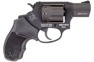 Black Taurus revolver on white background
