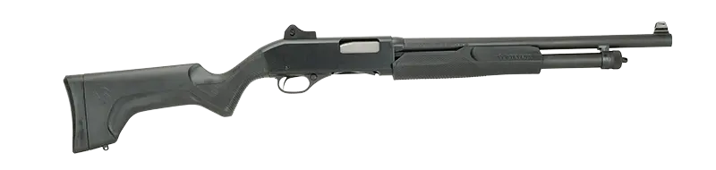 Black pump-action shotgun isolated on a black background